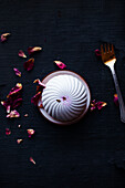 Festive Lemon Coconut single serving of Cake with Dried Rose Petals
