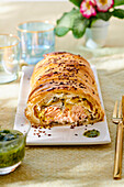Puff pastry and salmon strudel with leeks