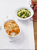 Baked carrot and sweet potato mash and Ginger and sesame sprouts