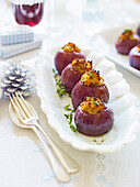 Baked stuffed red onions