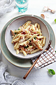 Penne pasta with chicken and bacon