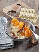 Rice pudding with white chocolate and tangerines