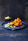 Thai corn fritters with pickled cucumber