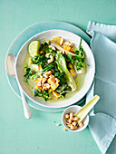 Green vegetable curry with pumpkin, pak choy and cashew nuts