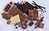 Different kinds of chocolate on a light background
