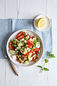 Artichoke and tomato salad with feta and mint