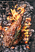Leg of lamb on a barbecue (Churrasco preparation)