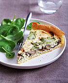 A piece of tart with mushrooms