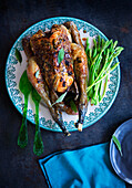 Roast chicken with sage and wild asparagus