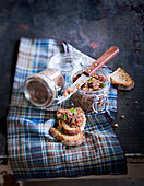Wild boar rillettes in a jar and on country bread