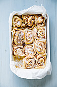 Apple and nut buns with cinnamon and icing
