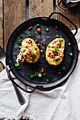 Stuffed potatoes with bacon and sour cream