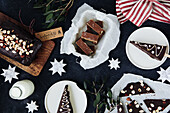 Spice cake, peanut fudge bars, cheesecake sticks, chocolate bark for Christmas
