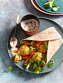 White bean falafel with pepper sauce