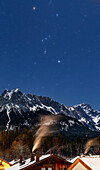 Orion constellation over mountains, Bavaria, Germany