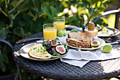 Autumn brunch with omelette, figs and garden salad
