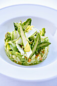 Green risotto with asparagus and avocado