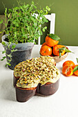 Colomba di Pasqua (traditional Italian Easter cake in the shape of a dove) with pistachio icing