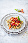 Poppy seed noodles with strawberries and balsamic caramel (vegetarian)