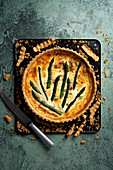 Asparagus quiche on a baking tray