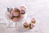 Pink meringues with chocolate cream (Christmas)