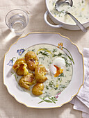 Creamy dill sauce with poached eggs