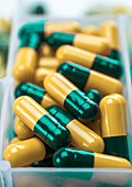 Green and yellow capsules