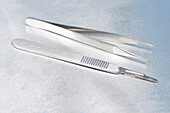 Scalpel and forceps