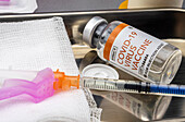 Covid-19 vaccine in a hospital, conceptual image