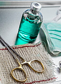 Surgical scissors and vial