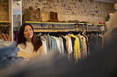 Female shop owner in clothing boutique