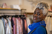 Senior woman in clothing boutique