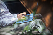 Businessman working at laptop