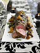 Roast fillet of beef with shallots and mushrooms