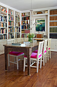 Dining room with floor-to-ceiling bookshelves