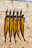 Hanging smoked mackerel