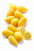 Snacking lemons against a white background