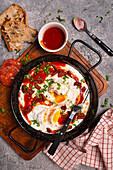 Turkish style eggs with chorizo and parsley