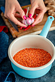 Preparing lentils and garlic