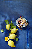 Lemons, orange, almonds and nzuddi (Sicilian almond biscuits)