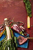 Tuna, chard, striped aubergines and spices