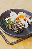 Warm lentil salad with carrots, parsnips and mushrooms