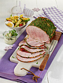 Gammon in a herb coating with pasta salad