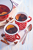 Spicy plum brandy punch with caramel