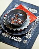 Zest in water with star anise