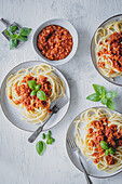Spaghetti with lentil tomato sauce and basil from above