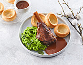 Lamb shank wth mashed peas and Yorkshire pudding
