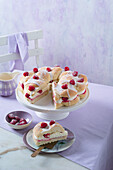 Easter Cake with eggnog cream and raspberries