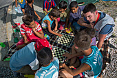 Children playing chess in Kara Tepe refugee camp, Greece