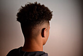 Back of a teenage boy's head